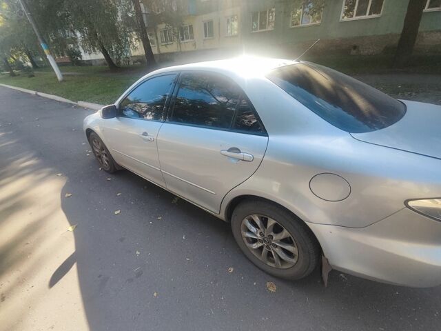 Серый Мазда 6, объемом двигателя 2 л и пробегом 244 тыс. км за 5300 $, фото 5 на Automoto.ua