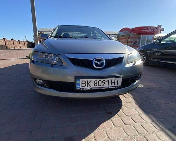 Серый Мазда 6, объемом двигателя 2 л и пробегом 301 тыс. км за 4100 $, фото 5 на Automoto.ua