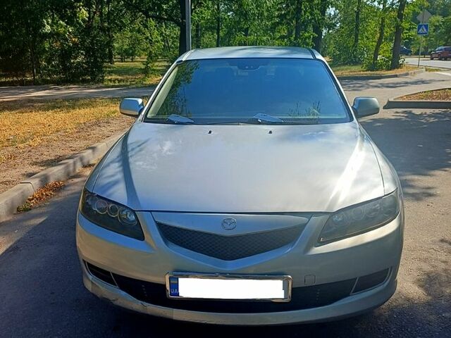 Серый Мазда 6, объемом двигателя 2 л и пробегом 244 тыс. км за 3600 $, фото 1 на Automoto.ua
