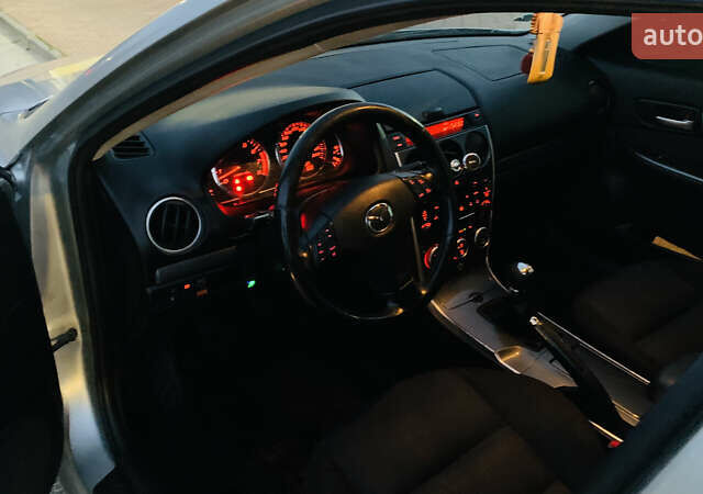 Серый Мазда 6, объемом двигателя 2 л и пробегом 310 тыс. км за 4250 $, фото 5 на Automoto.ua