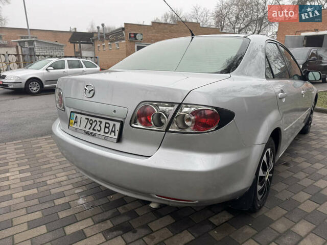 Серый Мазда 6, объемом двигателя 1.8 л и пробегом 302 тыс. км за 3800 $, фото 9 на Automoto.ua