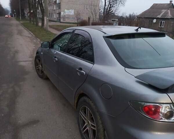 Серый Мазда 6, объемом двигателя 1.8 л и пробегом 240 тыс. км за 3999 $, фото 1 на Automoto.ua