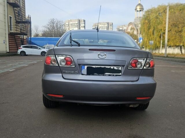 Серый Мазда 6, объемом двигателя 2 л и пробегом 140 тыс. км за 1757 $, фото 4 на Automoto.ua