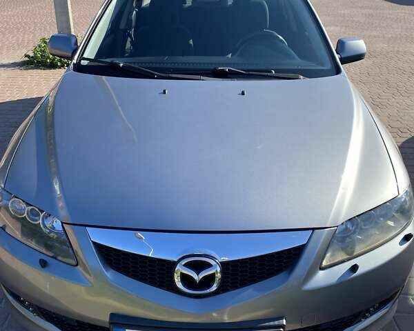 Серый Мазда 6, объемом двигателя 2 л и пробегом 301 тыс. км за 4100 $, фото 1 на Automoto.ua