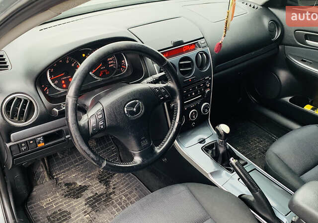 Серый Мазда 6, объемом двигателя 2 л и пробегом 307 тыс. км за 4450 $, фото 4 на Automoto.ua