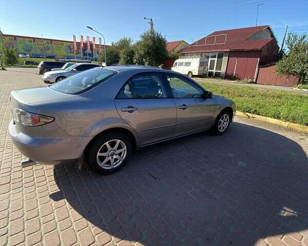 Серый Мазда 6, объемом двигателя 2 л и пробегом 301 тыс. км за 4100 $, фото 3 на Automoto.ua