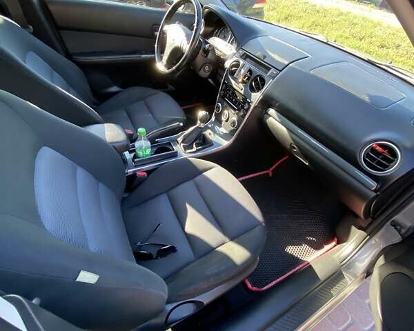 Серый Мазда 6, объемом двигателя 2 л и пробегом 301 тыс. км за 4100 $, фото 8 на Automoto.ua