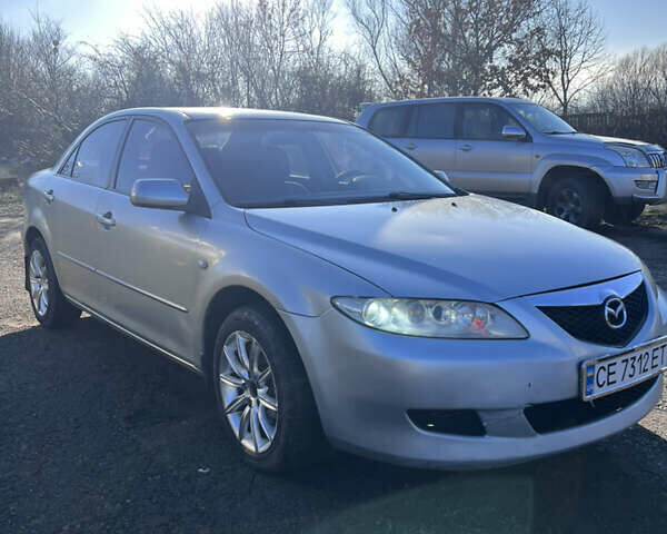 Серый Мазда 6, объемом двигателя 1.8 л и пробегом 350 тыс. км за 2750 $, фото 1 на Automoto.ua