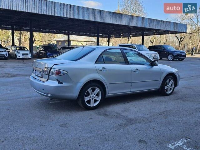 Серый Мазда 6, объемом двигателя 1.8 л и пробегом 250 тыс. км за 2750 $, фото 1 на Automoto.ua