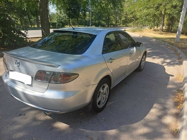 Серый Мазда 6, объемом двигателя 2 л и пробегом 247 тыс. км за 3500 $, фото 2 на Automoto.ua