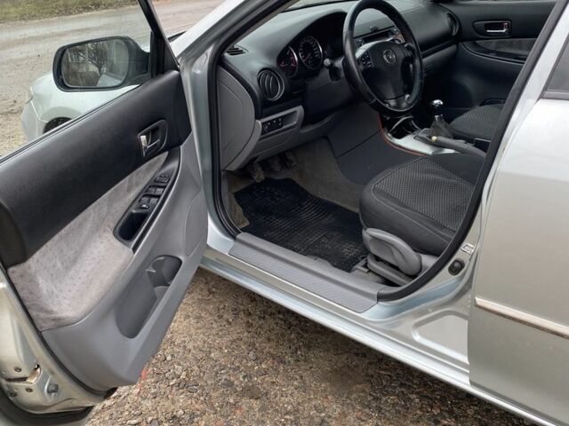 Серый Мазда 6, объемом двигателя 2 л и пробегом 285 тыс. км за 4300 $, фото 7 на Automoto.ua