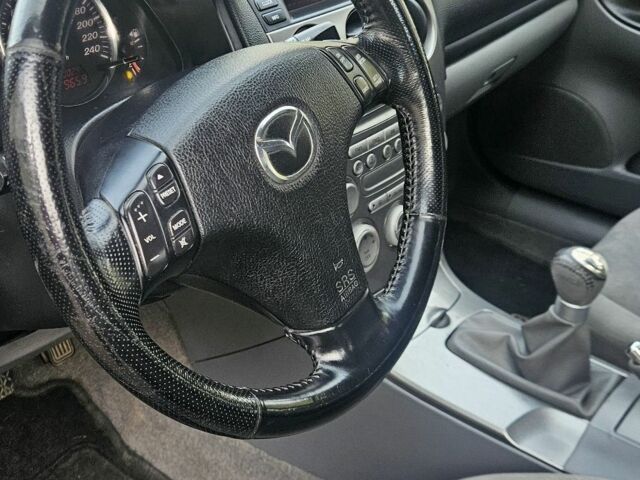 Серый Мазда 6, объемом двигателя 2 л и пробегом 140 тыс. км за 1757 $, фото 21 на Automoto.ua