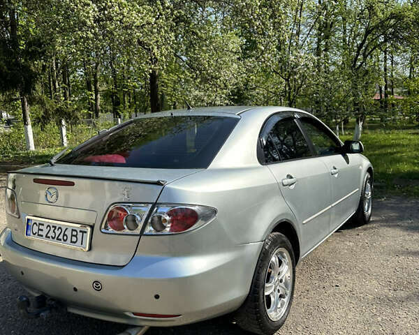 Сірий Мазда 6, об'ємом двигуна 2 л та пробігом 225 тис. км за 4859 $, фото 5 на Automoto.ua