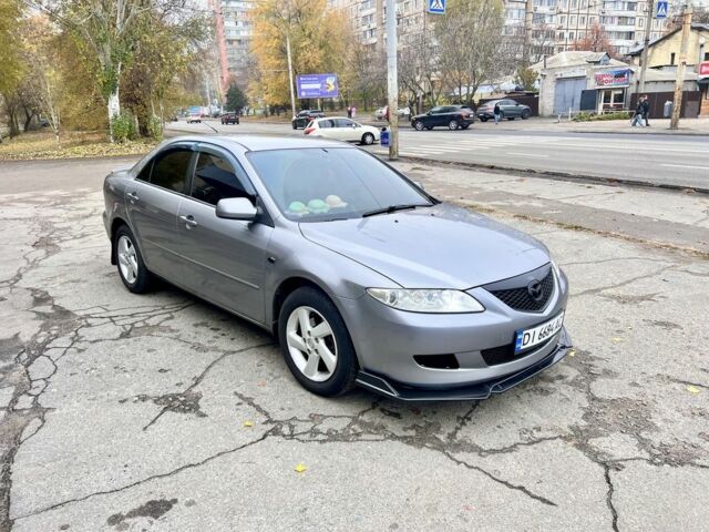 Серый Мазда 6, объемом двигателя 2 л и пробегом 230 тыс. км за 4999 $, фото 2 на Automoto.ua