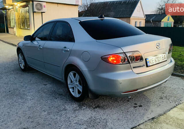 Серый Мазда 6, объемом двигателя 2 л и пробегом 310 тыс. км за 4250 $, фото 2 на Automoto.ua