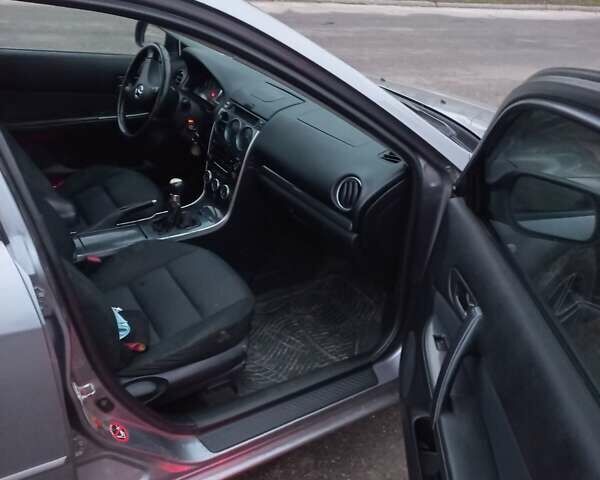 Серый Мазда 6, объемом двигателя 1.8 л и пробегом 240 тыс. км за 3999 $, фото 5 на Automoto.ua