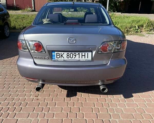 Серый Мазда 6, объемом двигателя 2 л и пробегом 301 тыс. км за 4100 $, фото 4 на Automoto.ua