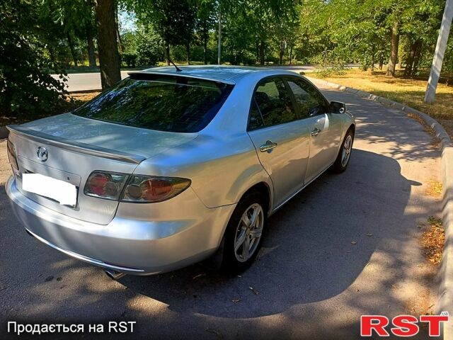 Серый Мазда 6, объемом двигателя 2 л и пробегом 244 тыс. км за 3600 $, фото 4 на Automoto.ua