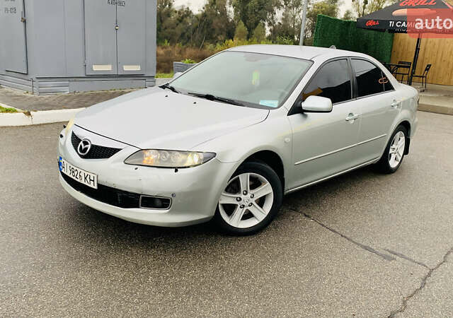 Серый Мазда 6, объемом двигателя 2 л и пробегом 307 тыс. км за 4450 $, фото 1 на Automoto.ua