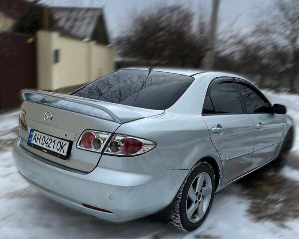 Серый Мазда 6, объемом двигателя 2 л и пробегом 212 тыс. км за 5000 $, фото 1 на Automoto.ua