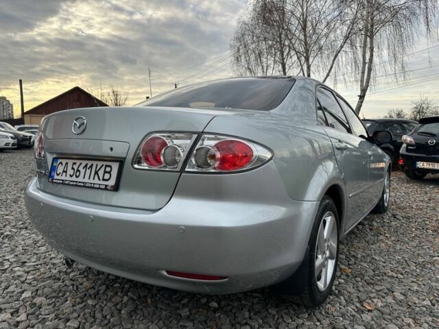 Сірий Мазда 6, об'ємом двигуна 2 л та пробігом 287 тис. км за 5300 $, фото 2 на Automoto.ua