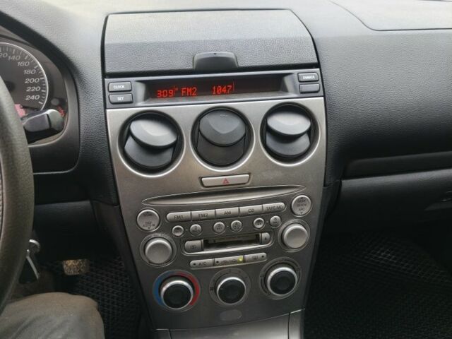 Серый Мазда 6, объемом двигателя 2 л и пробегом 222 тыс. км за 3500 $, фото 2 на Automoto.ua