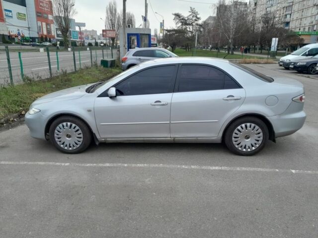 Серый Мазда 6, объемом двигателя 2 л и пробегом 361 тыс. км за 3800 $, фото 1 на Automoto.ua