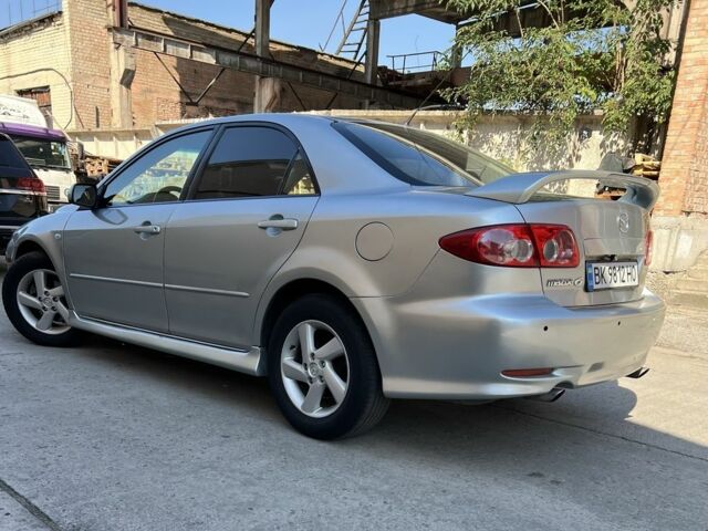 Серый Мазда 6, объемом двигателя 2 л и пробегом 270 тыс. км за 4000 $, фото 1 на Automoto.ua
