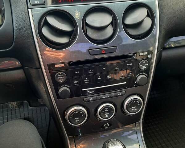 Серый Мазда 6, объемом двигателя 2 л и пробегом 336 тыс. км за 4500 $, фото 6 на Automoto.ua