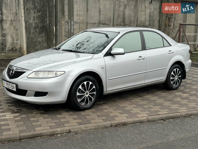 Серый Мазда 6, объемом двигателя 1.8 л и пробегом 302 тыс. км за 3800 $, фото 1 на Automoto.ua