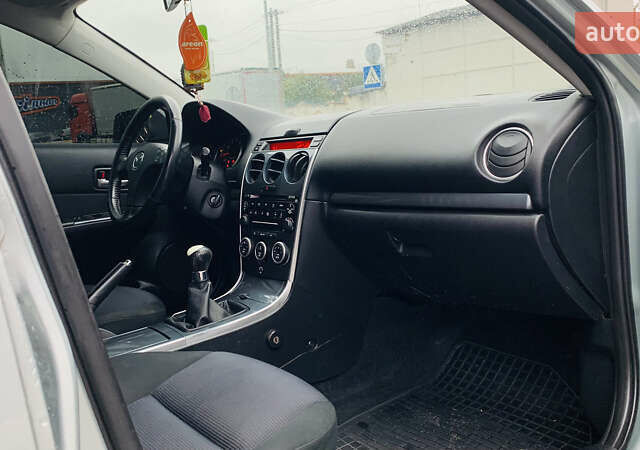 Серый Мазда 6, объемом двигателя 2 л и пробегом 310 тыс. км за 4250 $, фото 9 на Automoto.ua