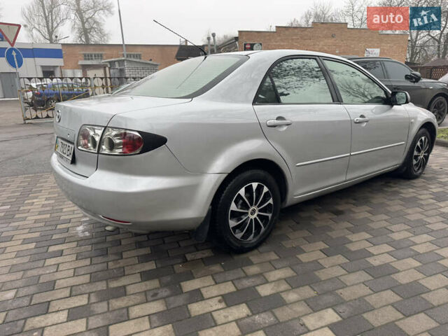Серый Мазда 6, объемом двигателя 1.8 л и пробегом 302 тыс. км за 3800 $, фото 7 на Automoto.ua
