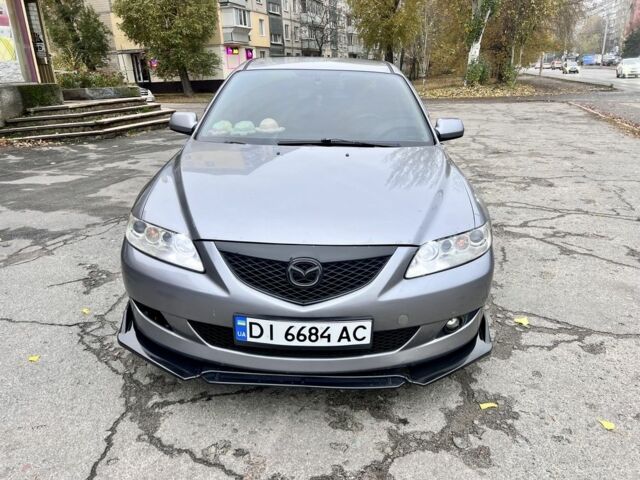 Серый Мазда 6, объемом двигателя 2 л и пробегом 230 тыс. км за 4999 $, фото 1 на Automoto.ua