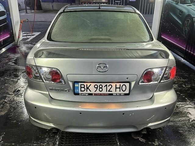 Серый Мазда 6, объемом двигателя 2 л и пробегом 250 тыс. км за 3091 $, фото 1 на Automoto.ua