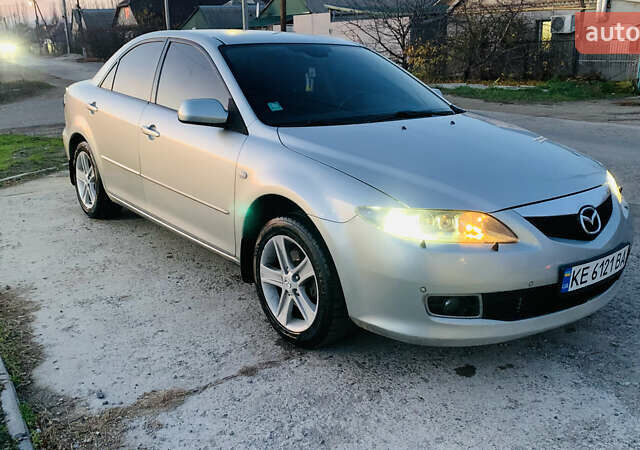 Серый Мазда 6, объемом двигателя 2 л и пробегом 310 тыс. км за 4250 $, фото 1 на Automoto.ua