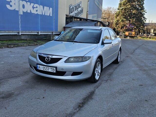 Серый Мазда 6, объемом двигателя 1.8 л и пробегом 200 тыс. км за 2750 $, фото 1 на Automoto.ua