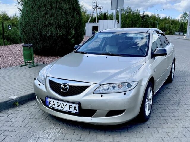 Сірий Мазда 6, об'ємом двигуна 2 л та пробігом 297 тис. км за 3790 $, фото 2 на Automoto.ua