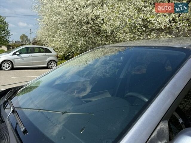 Серый Мазда 6, объемом двигателя 2 л и пробегом 218 тыс. км за 3200 $, фото 2 на Automoto.ua