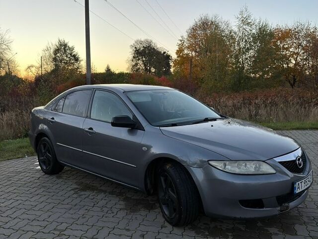 Серый Мазда 6, объемом двигателя 2 л и пробегом 235 тыс. км за 1999 $, фото 4 на Automoto.ua