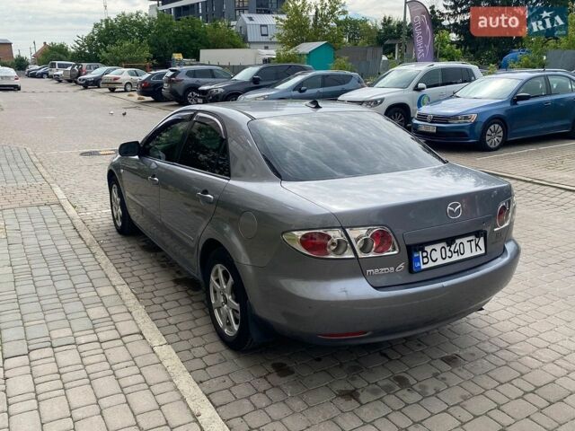 Сірий Мазда 6, об'ємом двигуна 2 л та пробігом 288 тис. км за 2999 $, фото 5 на Automoto.ua