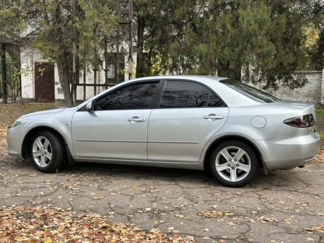 Серый Мазда 6, объемом двигателя 2 л и пробегом 250 тыс. км за 4500 $, фото 2 на Automoto.ua