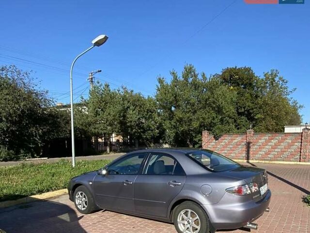Серый Мазда 6, объемом двигателя 2 л и пробегом 301 тыс. км за 4100 $, фото 2 на Automoto.ua