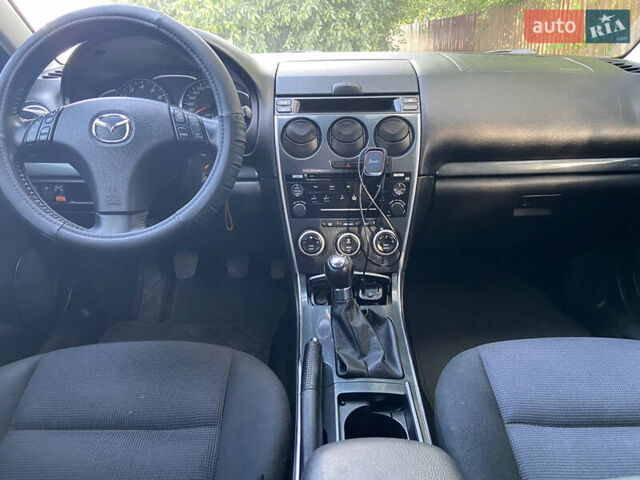 Серый Мазда 6, объемом двигателя 2 л и пробегом 182 тыс. км за 4600 $, фото 11 на Automoto.ua