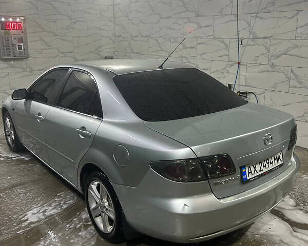 Серый Мазда 6, объемом двигателя 2 л и пробегом 265 тыс. км за 3800 $, фото 2 на Automoto.ua