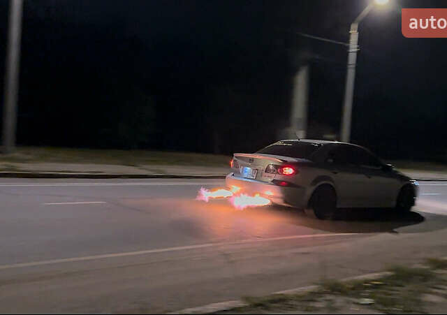 Сірий Мазда 6, об'ємом двигуна 2.3 л та пробігом 200 тис. км за 6900 $, фото 5 на Automoto.ua