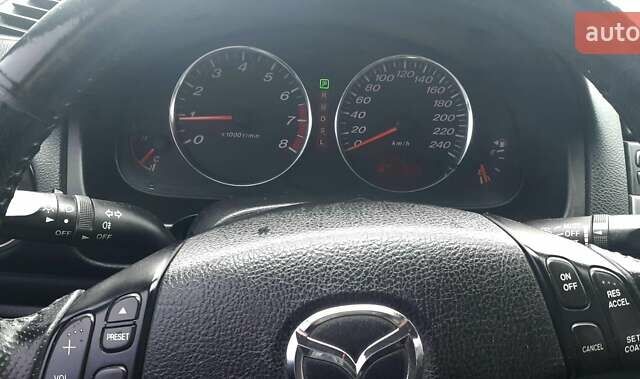 Серый Мазда 6, объемом двигателя 2 л и пробегом 254 тыс. км за 5500 $, фото 2 на Automoto.ua