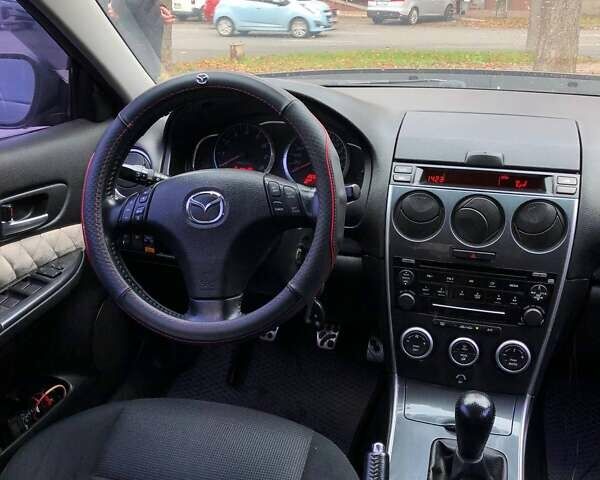 Мазда 6 2006 у Черкасах на Automoto.ua Сірий Мазда 6, об'ємом двигуна 2 л та пробігом 269 тис. км за 4900 $, фото 7 на Automoto.ua