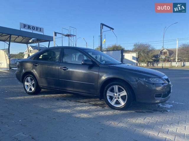 Сірий Мазда 6, об'ємом двигуна 2 л та пробігом 229 тис. км за 4600 $, фото 3 на Automoto.ua