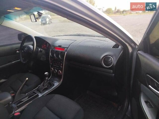 Сірий Мазда 6, об'ємом двигуна 2 л та пробігом 202 тис. км за 4000 $, фото 52 на Automoto.ua