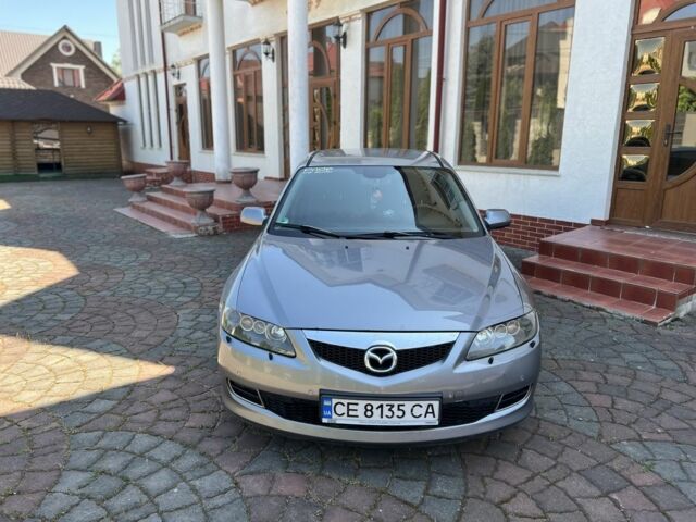 Серый Мазда 6, объемом двигателя 2 л и пробегом 240 тыс. км за 3900 $, фото 1 на Automoto.ua
